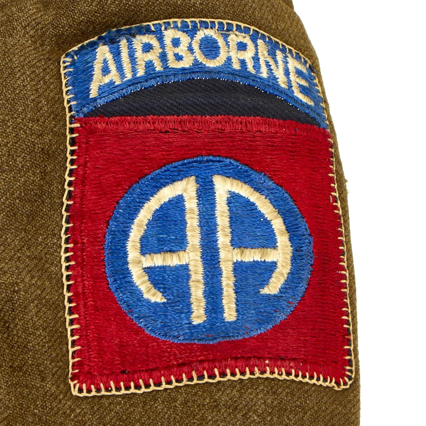Original U.S. WWII 82nd Airborne - 1st Allied Airborne Class A Uniform Jacket with Invasion Arrowhead ETO and Purple Heart Ribbon