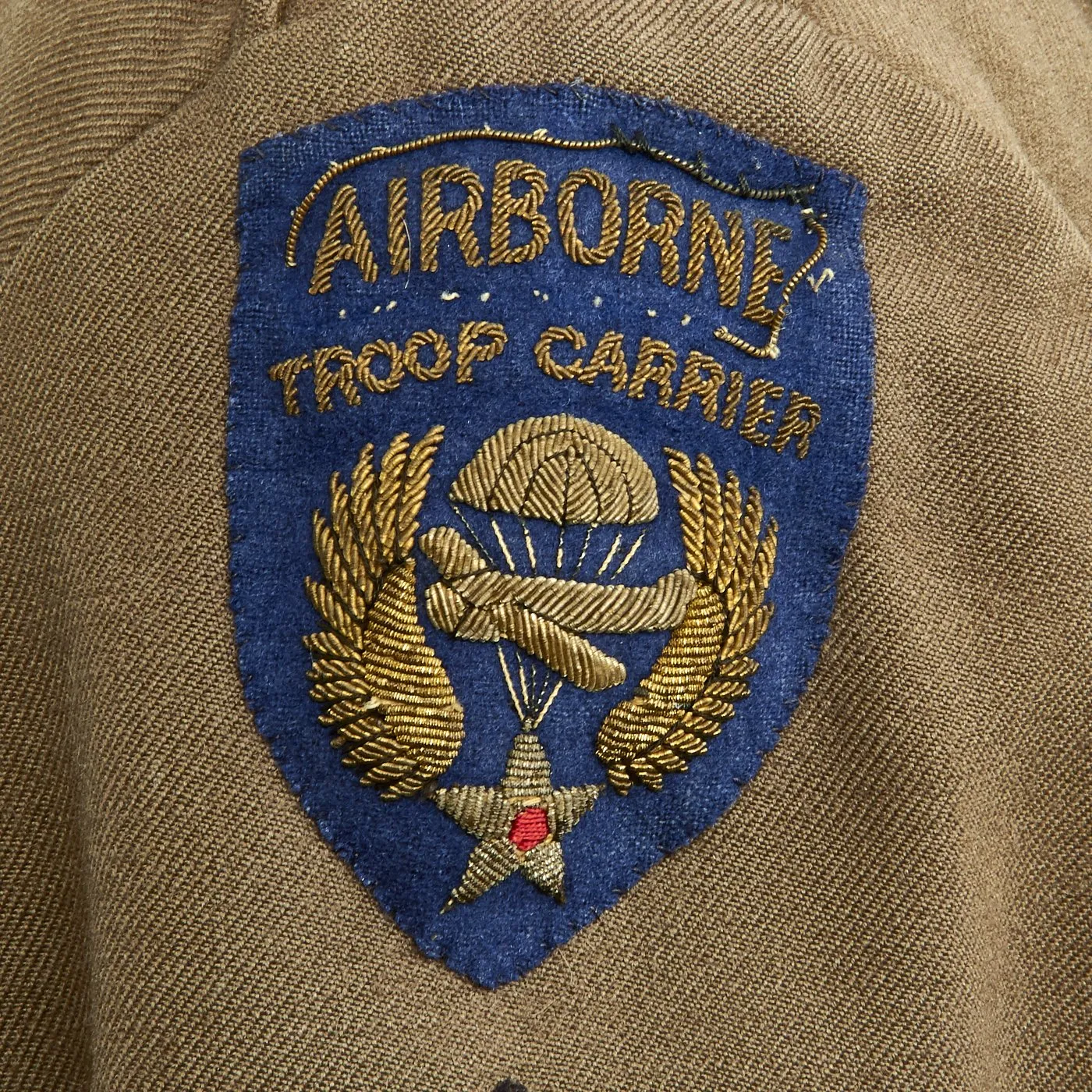 Original U.S. WWII Airborne Troop Carrier Air Crewman Ike Jacket with Bullion Embroidered Patches