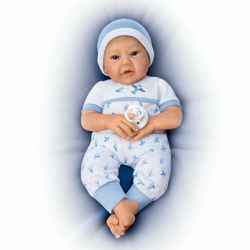 The Ashton - Drake Galleries New To The Crew Baby Boy Doll Weighted Poseable TrueTouch® Authentic Silicone with Helicopter Pacifier and Outfit by Michelle Fagan 18-inches